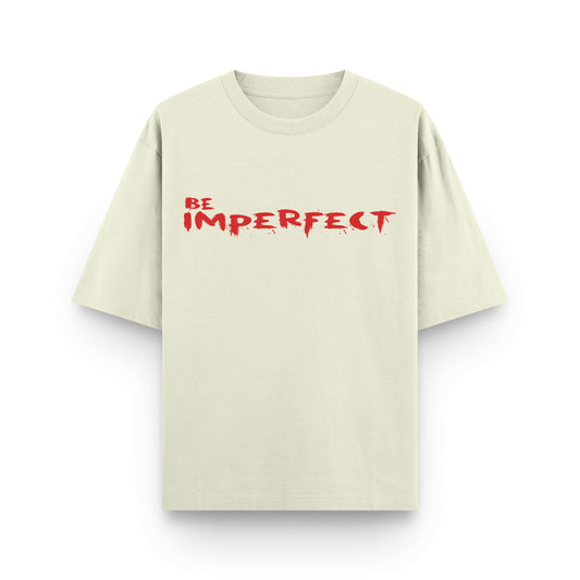 Oversized beige streetwear t-shirt with bold “Be Imperfect” red graphic print by BLAACK