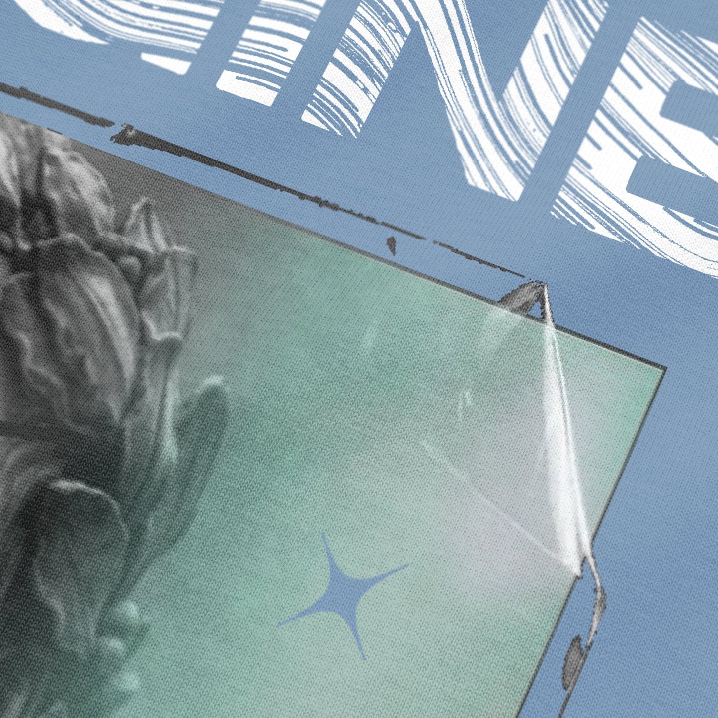 Close-up view of sculpture artwork on urban melange oversized t-shirt by BLAACK