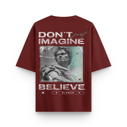 Oversized wine streetwear t-shirt with sculpture artwork and "Don’t Just Imagine Believe" text design on back by BLAACK