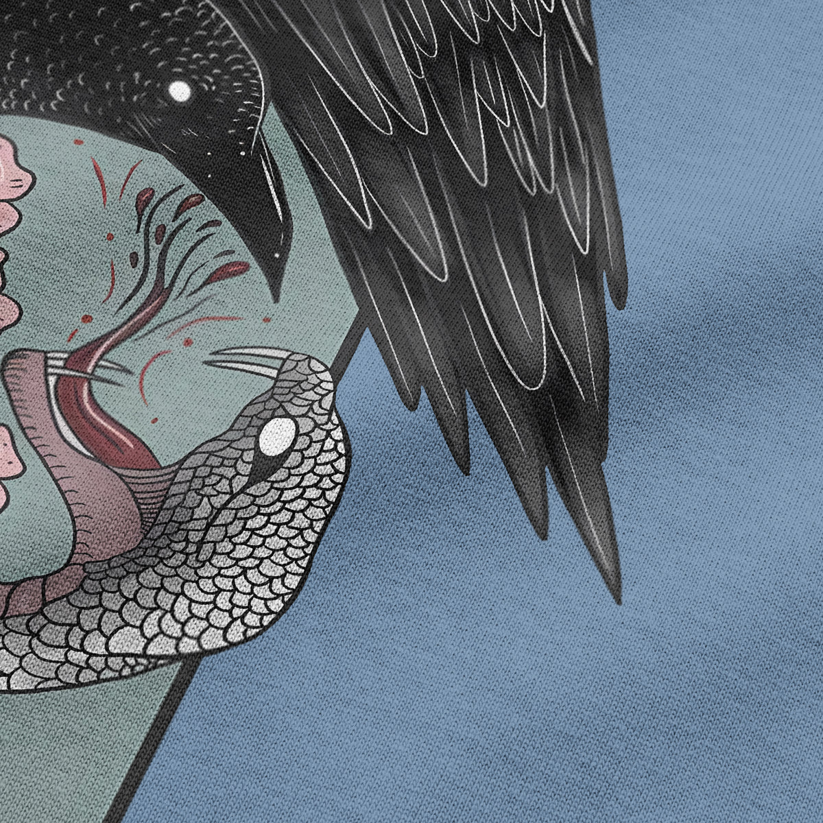 Close-up of Crow vs Snake T-shirt print featuring Japanese-inspired graphic on light blue oversized T-shirt by BLAACK