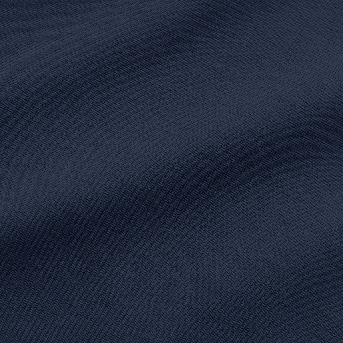 Close-up of navy blue plain oversized T-shirt fabric by BLAACK