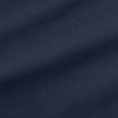 Close-up of navy blue plain oversized T-shirt fabric by BLAACK