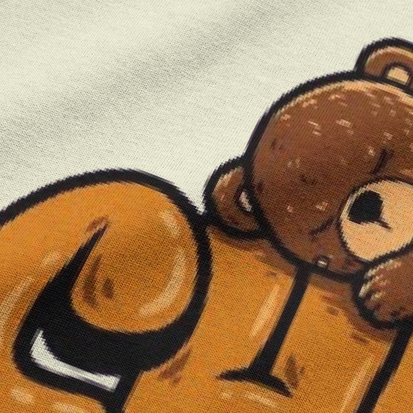 Close-up view of chill typography on beige oversized t-shirt by BLAACK