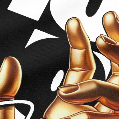 Close-up view of golden hand on black oversized t-shirt by BLAACK