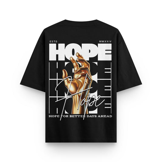 Oversized black streetwear t-shirt with golden hand graphic and "Hope" text design on back by BLAACK