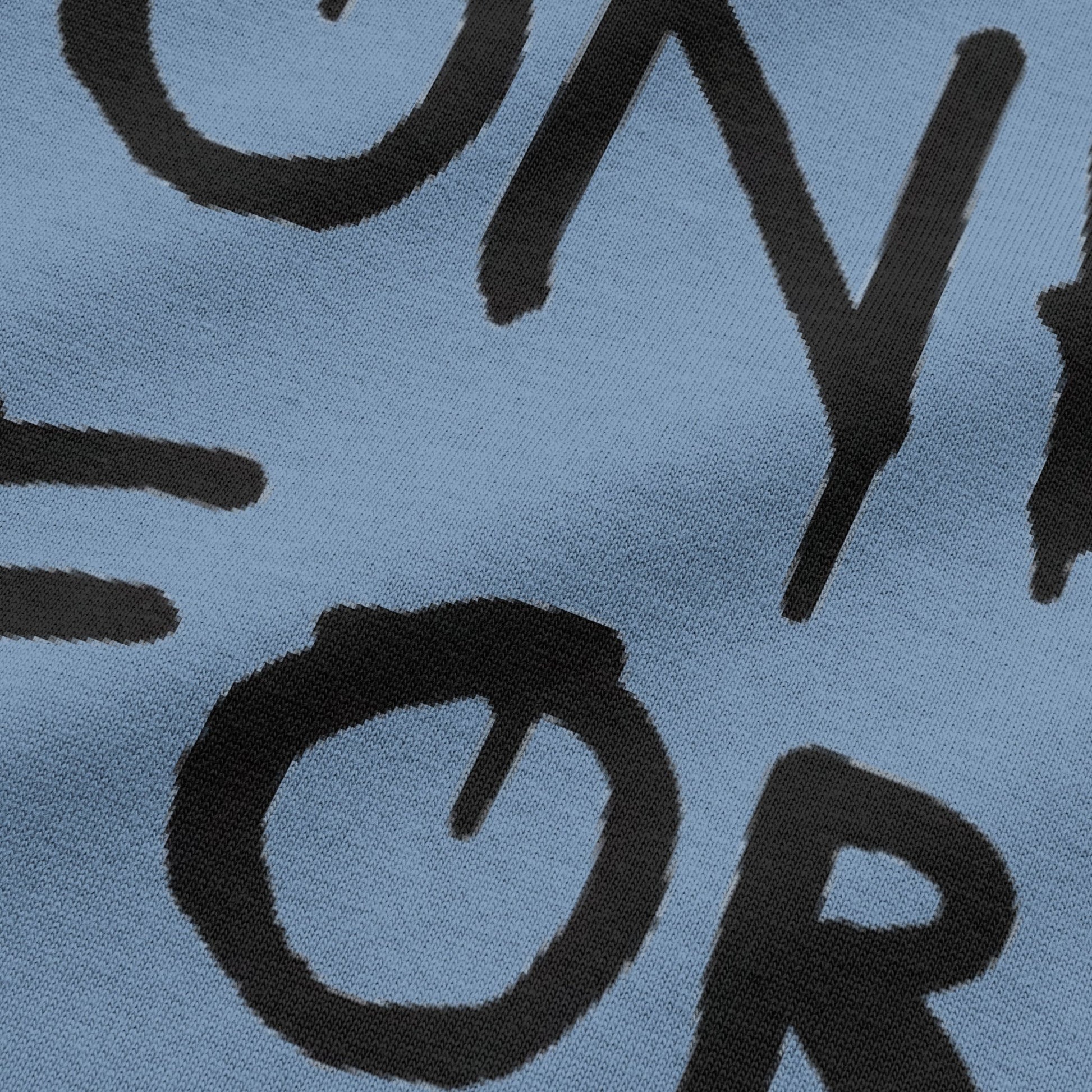 Close-up view of NEED MONEY FOR BMW typography on urban melange oversized t-shirt by BLAACK