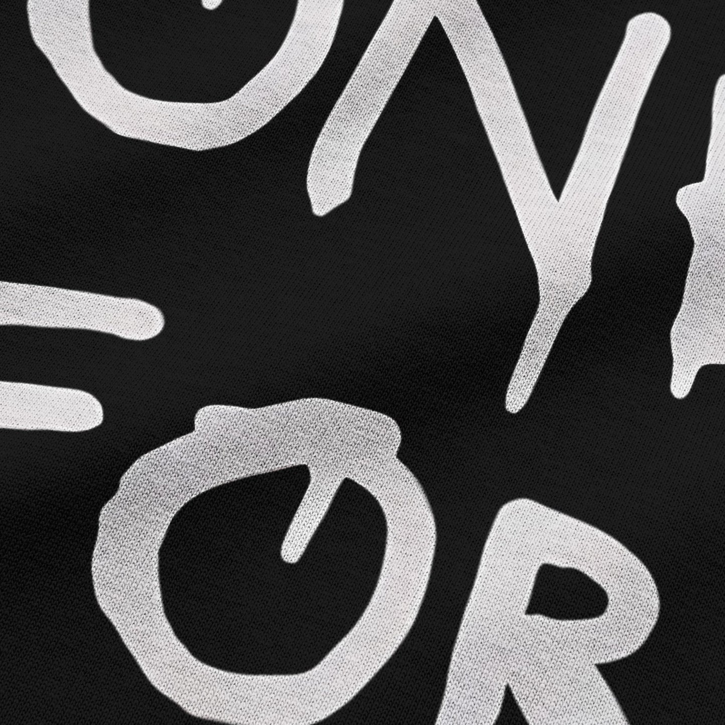 Close-up view of NEED MONEY FOR BMW typography on black oversized t-shirt by BLAACK