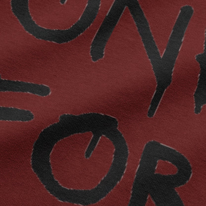 Close-up view of NEED MONEY FOR BMW typography on wine oversized t-shirt by BLAACK