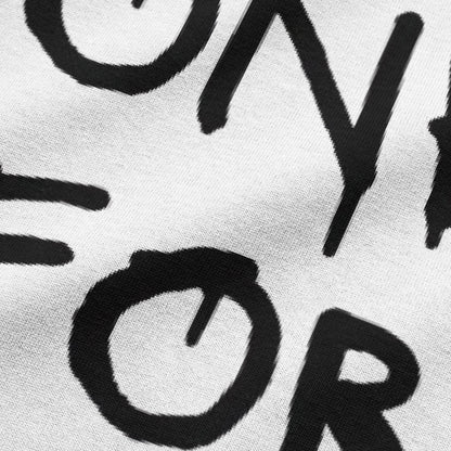 Close-up view of NEED MONEY FOR BMW typography on white oversized t-shirt by BLAACK