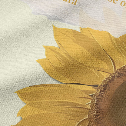 Close-up of sunflower graphic print on beige oversized t-shirt by BLAACK