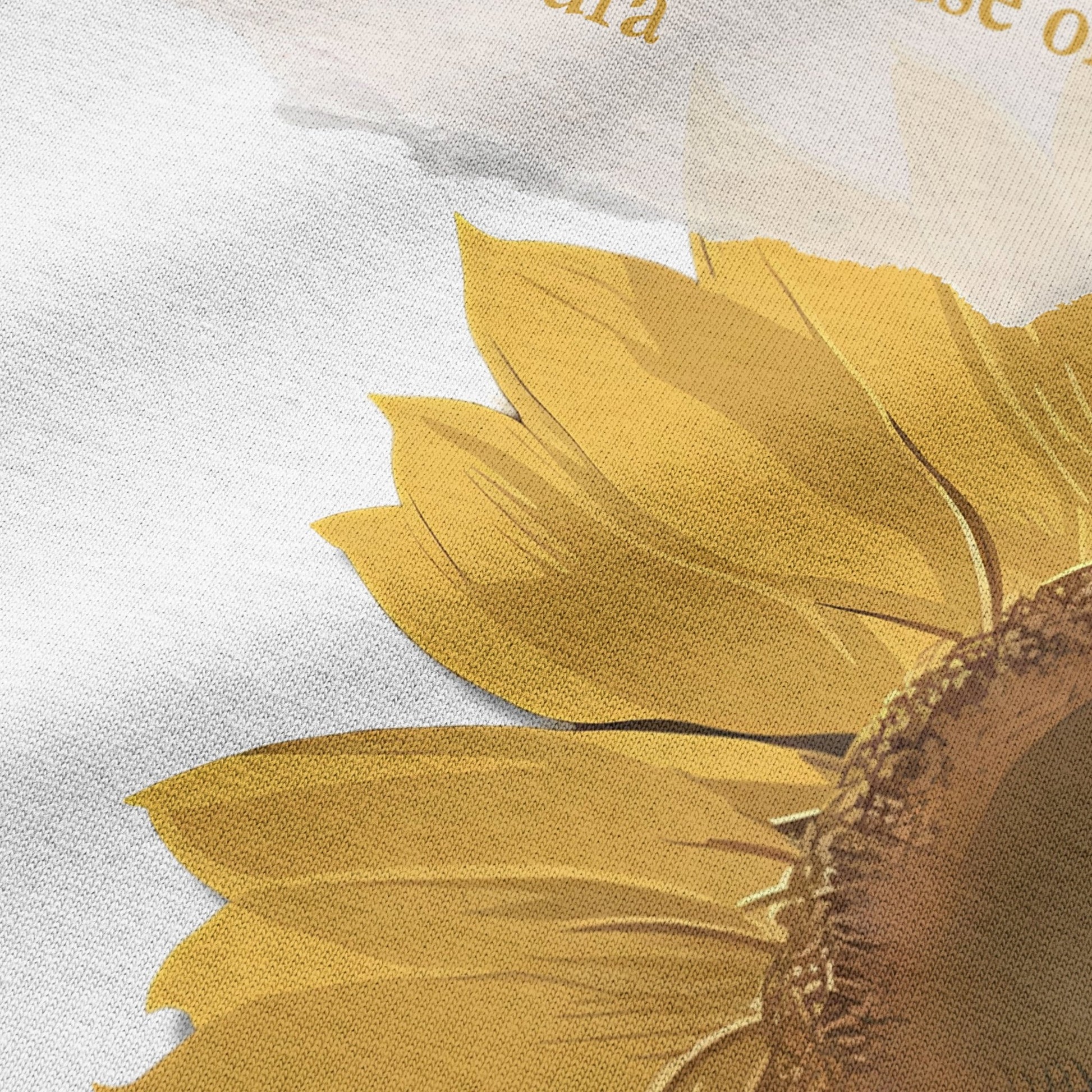 Close-up of sunflower graphic print on white oversized t-shirt by BLAACK