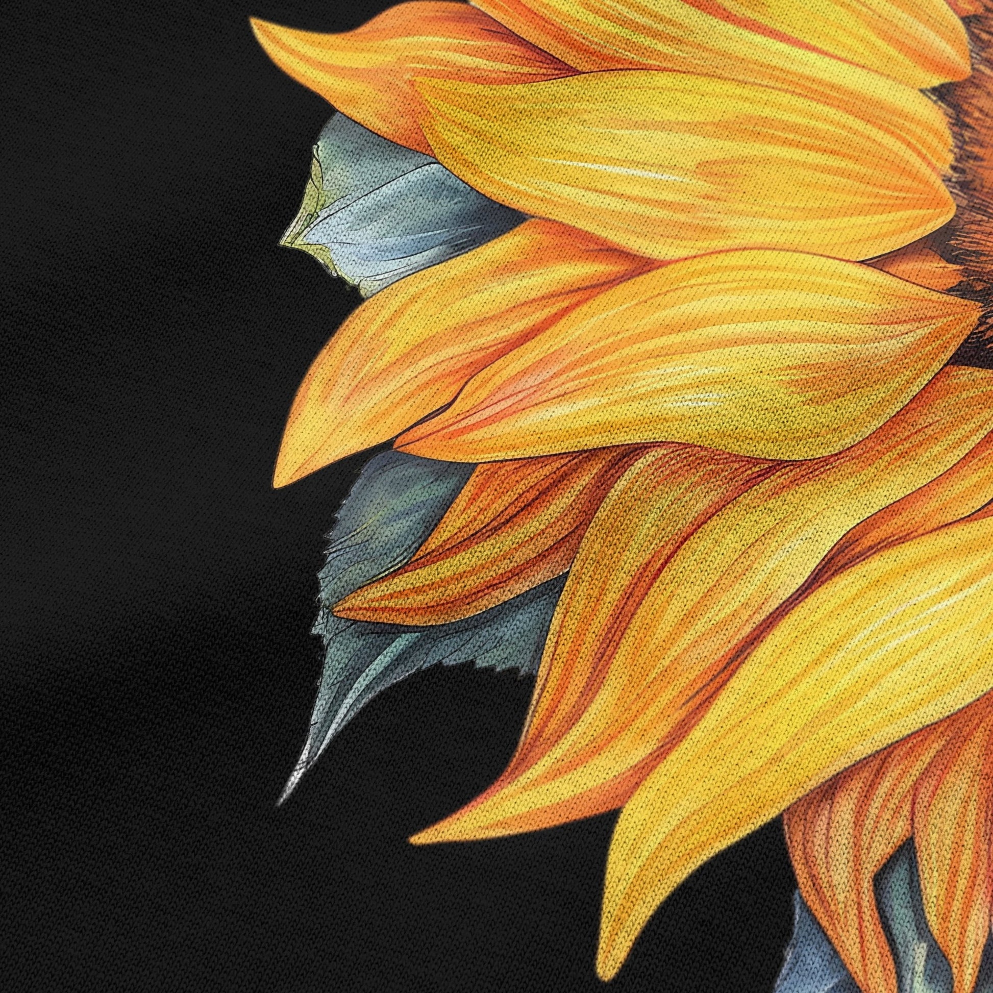 Close-up of sunflower graphic print on black oversized t-shirt by BLAACK